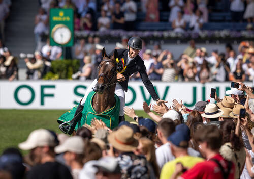 Richard Vogel (GER) with United Touch S celebrating victory in the Rolex Grand Prix