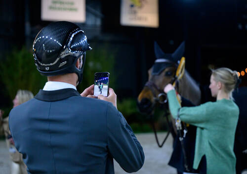 Richard Vogel (GER) takes photograph of Cubi Cubells in the Jumping International CSI5* at the Dutch Masters 2025