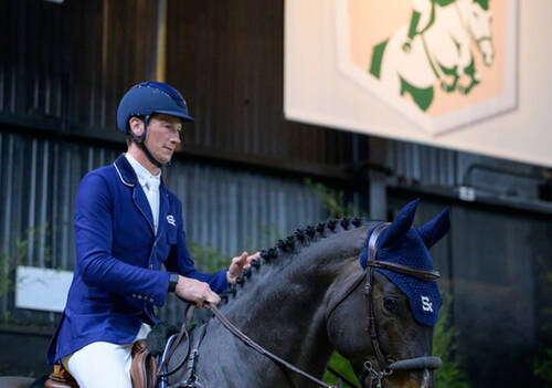 Daniel Deusser (GER) with Otello de Guldenboom following victory in the Audi Prize
