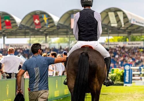 Martin Fuchs (SUI) rides Conner Jei as he makes his way out