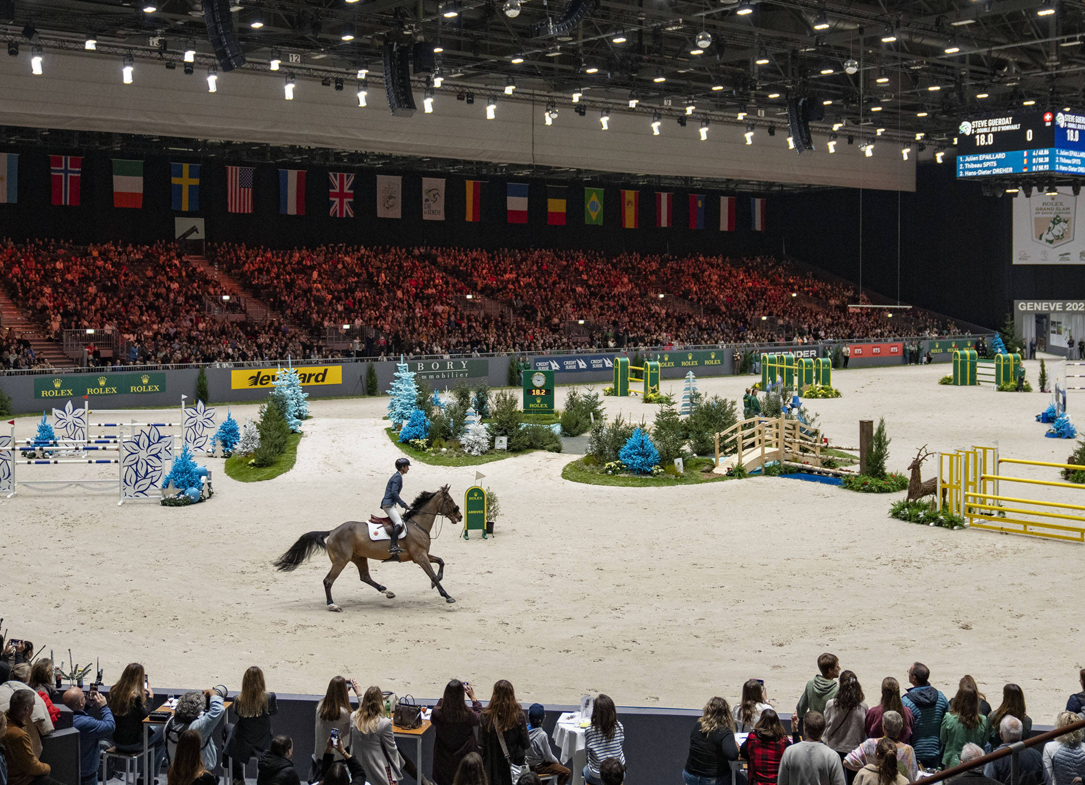 A general view of the arena with Steve Guerdat riding Double Jeu D’Honvault in the Coupe De Genève 1.6m